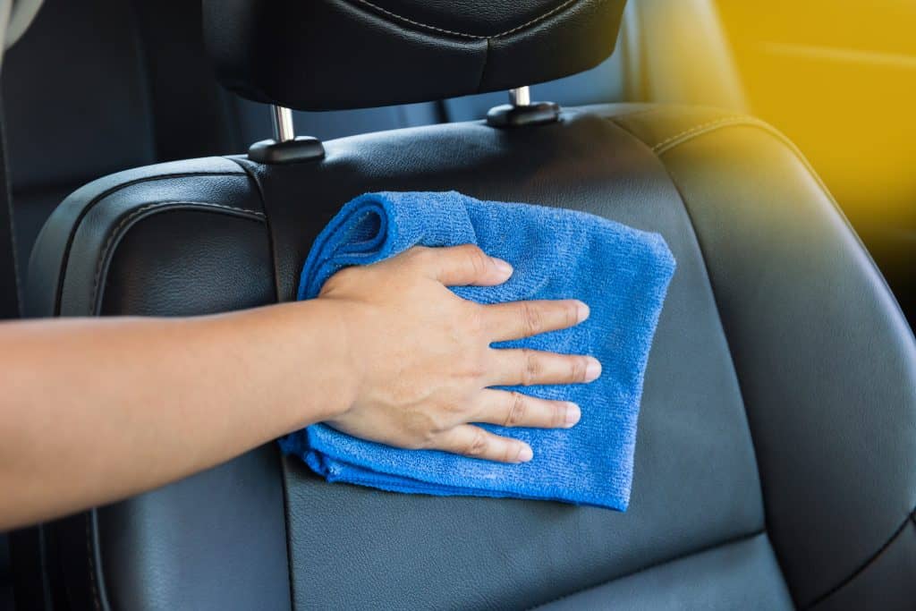 To Clean Leather Car Seats, Towel Under Car Seat To Protect Leather